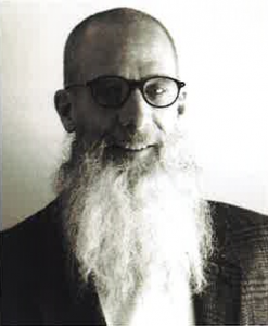 man with a beard and glasses in black and white